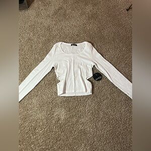White long sleeve shirt. Never worn. Size M.